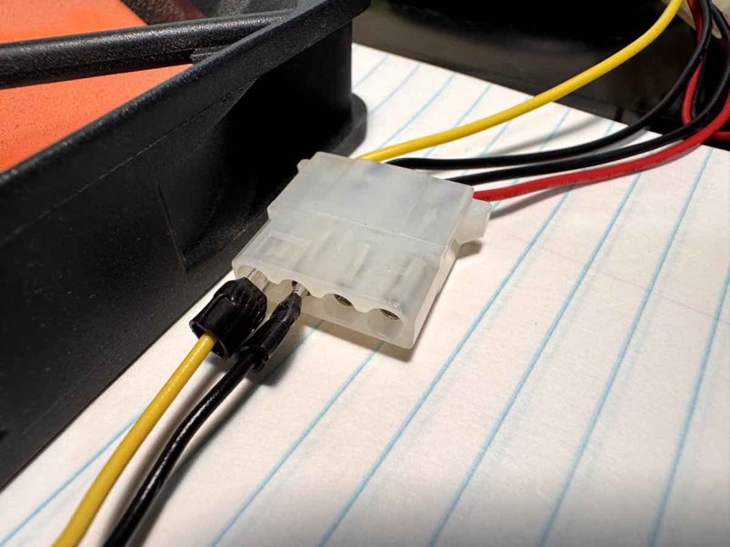 terminals pluggin into 12V/Gnd wires on Molex connector